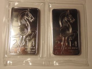 2 - 10 Oz Year Of The Horse Silver Bar.  999 Fine photo