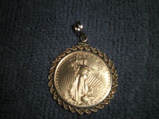 $25 1/2 Ounce Gold Coin 1999 With Gold Bezel photo