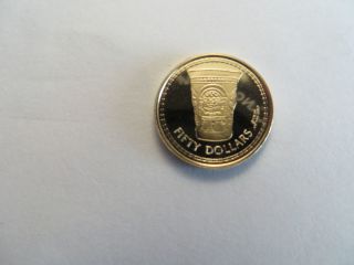 1988 British Vi Fifty Dollar Gold Coin, .  500 Gold, .  0333 Agw,  Tribal Art Design photo
