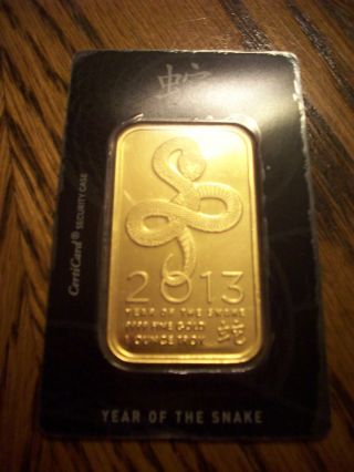 2013 Year Of The Snake 1 Troy Ounce.  9999 Fine Certified Gold Bar photo