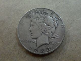 1935 - S Peace Silver Dollar,  Fine Coin. . . . . . . . . . . . . . . . . . . . . . . . . .  Look photo