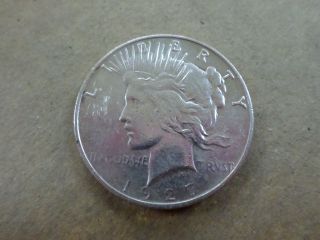 1927 - D Peace Silver Dollar,  Almost Uncirculated. . . . . . . . . . . . . . . .  Look photo