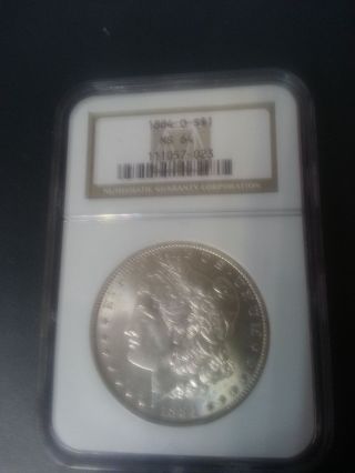 1884 - O Morgan Silver Dollar - Ms - 64 Ngc photo