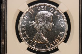 1964 Canada.  1$ Dollar.  Charlottetown.  Ngc Graded Pl65.  (2) photo