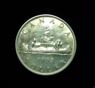 Canada 1960 Dollar Coin.  800 Silver Au Voyageur photo