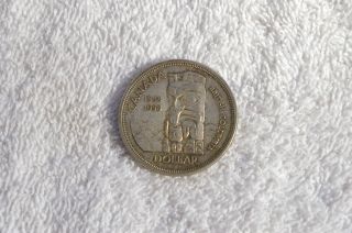 1958 Canadian Commemorative Silver Dollar. . . . photo