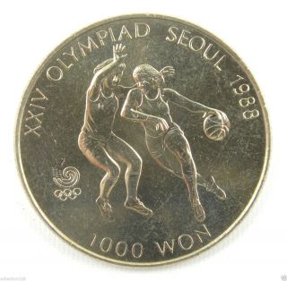 Korea - South 1000 Won,  1986,  1988 Olympics Basketball Unc photo