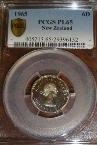 1965 Zealand Six Pence,  6d.  1965 - 6d Pcgs Pl - 65 photo