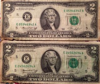 Two 2 Dollar Bills. photo