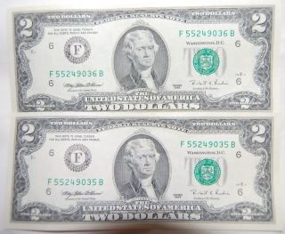 Two Dollar Bills Consecutive Numbered Usa Federal Reserve Note. photo