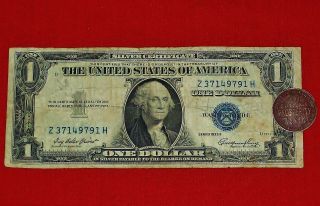 1935 One Dollar Silver Certificate & 1932 Prosperity Token,  Circulated photo