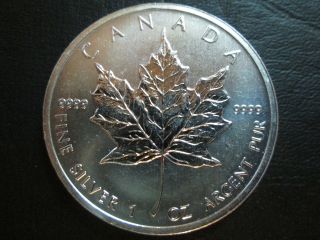 One 2011 9999 Fine Canada One Ounce Silver Maple Bullion Coin photo