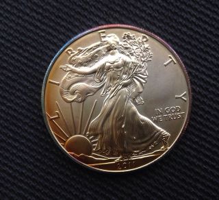 2011 American Silver Eagle Dollar Brilliant Uncirculated (rainbow Toning). . photo