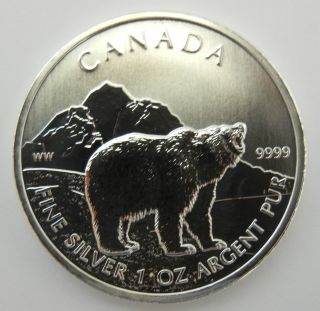 Four (4) Oz - Canadian Wildlife Series.  9999 Bu Silver Grizzy,  Cougar,  Moose,  Antelope photo