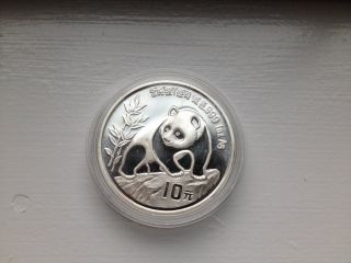 1990 Silver Chinese Panda,  Large Date,  10 Yuan Coin,  1oz. .  999 Fine Silver photo