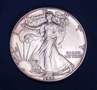 1987 American Silver Eagle Dollar | Uncirculated | Kointain Coin Case photo