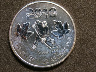2010 1 Oz Silver Maple Leaf Coin Canada Olympic Hockey 3rd Year Release photo