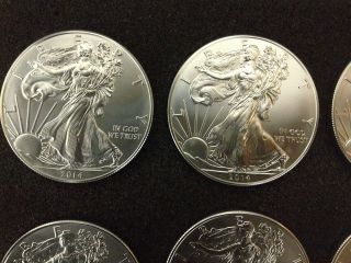 2014 1 Troy Oz Silver American Eagle Coin -.  999 Fine Silver - (bu) photo