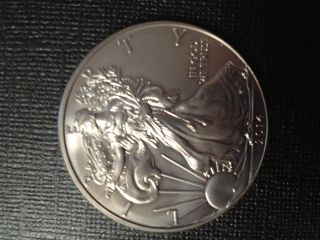2014 1 Ounce Silver American Dollar,  Brilliant Uncirculated photo