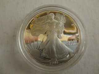 1991s American Eagle Silver Proof Dollar & photo