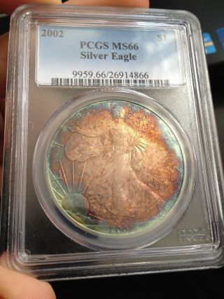 C4055 - 2002 Silver American Eagle Pcgs Ms66 - Monster Rainbow Obverse photo