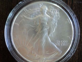 1986 American Silver Eagle Dollar,  Gem Brilliant Uncirculated Con Dition photo
