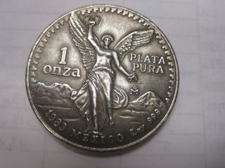 1983 Mexico Onza Libertad 1 Ounce Silver Coin.  999 Eagle Reverse photo