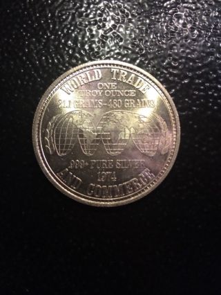 1974 World Trade And Commerce.  999 Fine 1 Oz Silver Coin photo