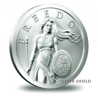 1oz Standing Freedom.  999 Silver Round | Silver Shield photo