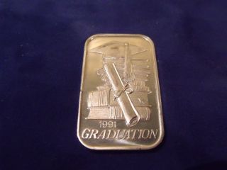 1991 Graduation One Troy Ounce.  999 Fine Silver Bar photo