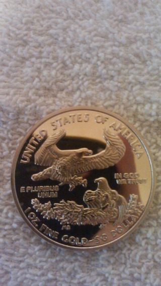 2011 $50 1oz.  Gold Eagle Coin Ungraded photo