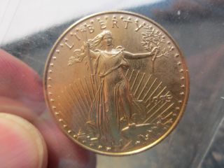 1995 American Eagle Gold 1/2 Ounce Uncirculated $25 Coin A photo
