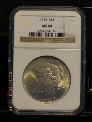 1923 - P Peace Silver Dollar Ngc Ms - 64 Uncirculated.  900 Fine photo