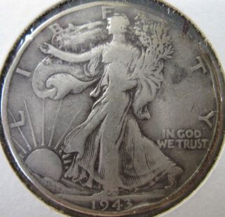 1943 Philadelphia Walking Liberty Silver Half Dollar Coin. photo