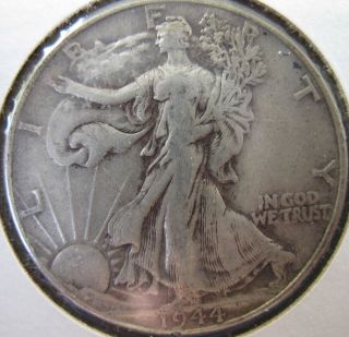 1944 Philadelphia Walking Liberty Silver Half Dollar Coin. photo
