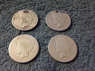 Four Peace Dollars,  90% Silver In Various Dates And Conditions photo