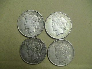 (4) Silver Peace Dollars (2) 1922 - D,  1923 - S,  1924 Circulated photo