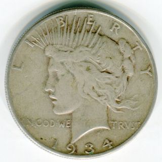 1934 - S $1 Peace Dollar F/vf Very Minor Rim Tick By Tail Feathers photo