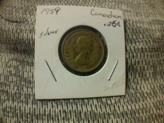 1959 Silver Canada.  25 Cents photo