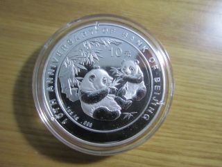 China 2006 Silver 1 Oz Panda Coin With Added Words - Bank Of Beijing photo