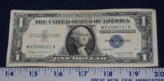 U.  S.  One Dollar Silver Certificate,  1957b,  Circulated,  Serial Number W63598221a. photo