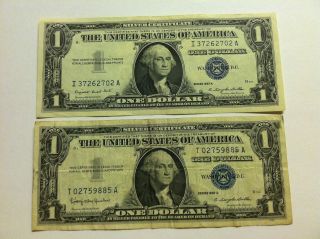 2 - 1957 $1 Silver Certificate Blue Seal Circulated photo