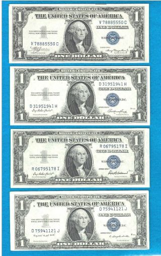 4 1935 Uncirculated One Dollar Silver Certificates photo