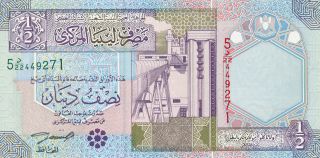 Libya Pick 63 (2002) 1/2 Dinar - Oil Refinery - Unc Banknote photo