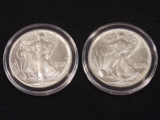 Two Brilliant Uncirculated 1991 American Eagle Silver Dollars photo