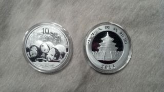 (( (2013 China 1 Troy Oz.  999 Silver Panda 10 Yuan Coin In Airtite)) ) photo