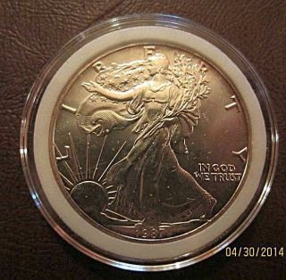 1987 American Silver Eagle Dollar Coin $1 Troy Ounce.  999 Fine Uncirculated 786 photo