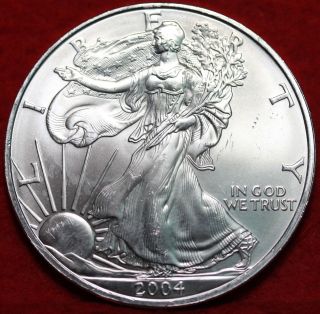 Uncirculated 2004 Silver American Eagle Dollar S/h photo