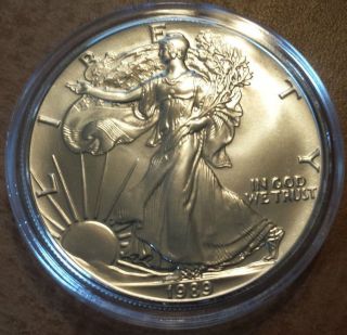 1989 American Silver Eagle 1 Troy Oz.  999 Fine - Bright Capsulated Coin photo