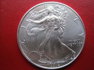 American Silver Eagle Dollar.  999 1 0z.  Fine Silver 2014 Unc photo